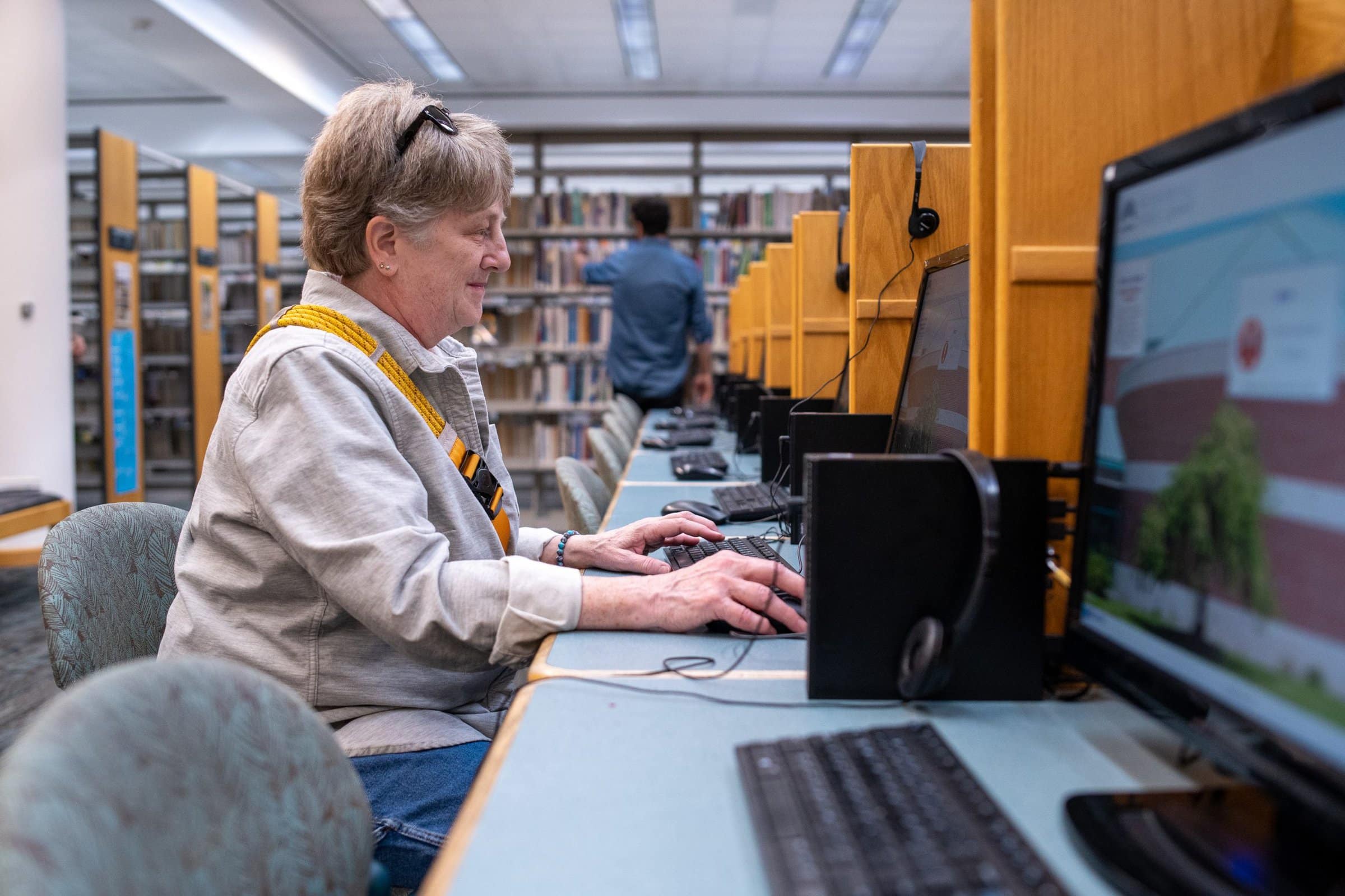 Patron using one of the very many public computers.